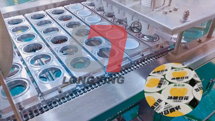 龍應(yīng)杯裝豆花全自動灌裝封口機(jī)